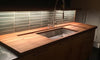 Premium proximity kitchensystem® counter in Iroko
